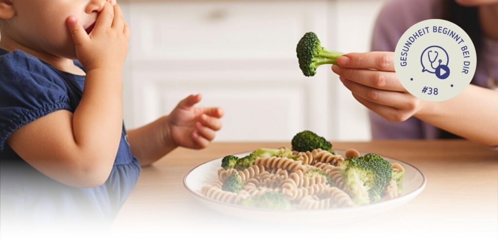kind mutter essen brokkoli